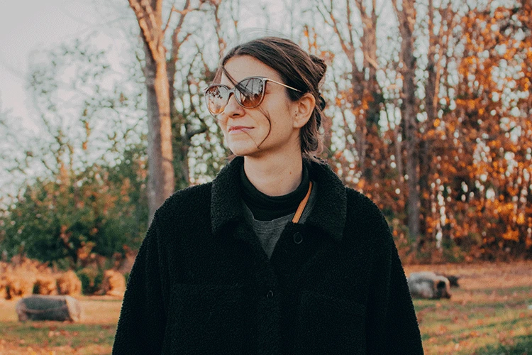 Women posing for a fall photoshoot, phototaken by with care media